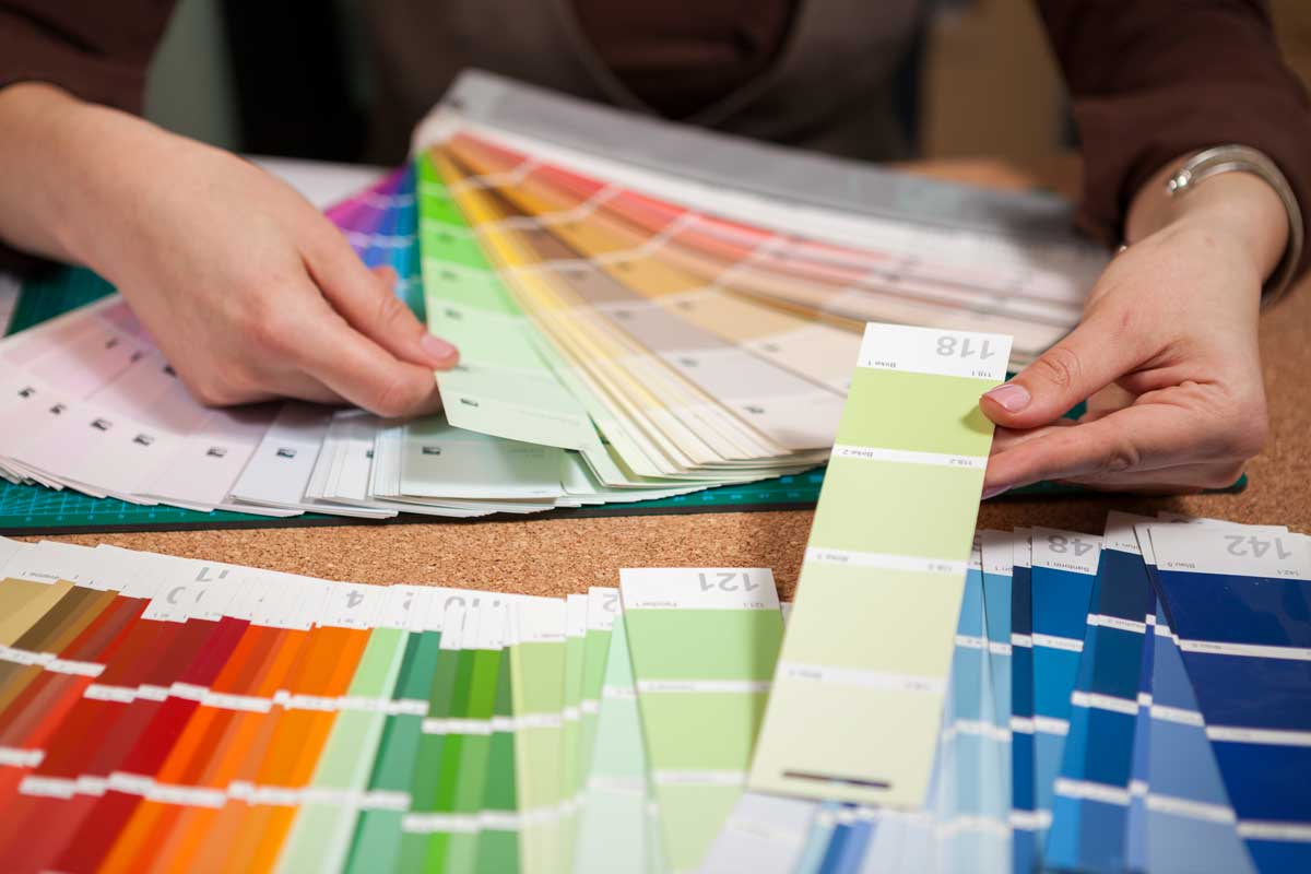Close Up Image Of Color Cards On Architect Desk